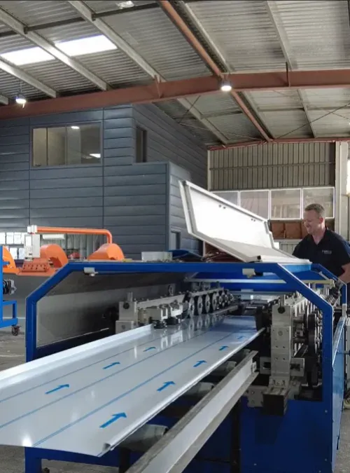 Custom folded COLORBOND rainwater goods in the Roofing Depot factory